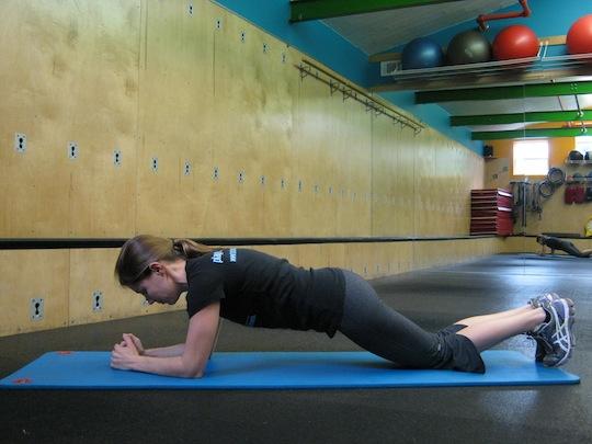 Personal Trainer, Tatum Rebel demonstrates Plank