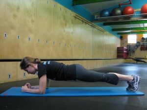 Personal Trainer, Tatum Rebel demonstrates Plank